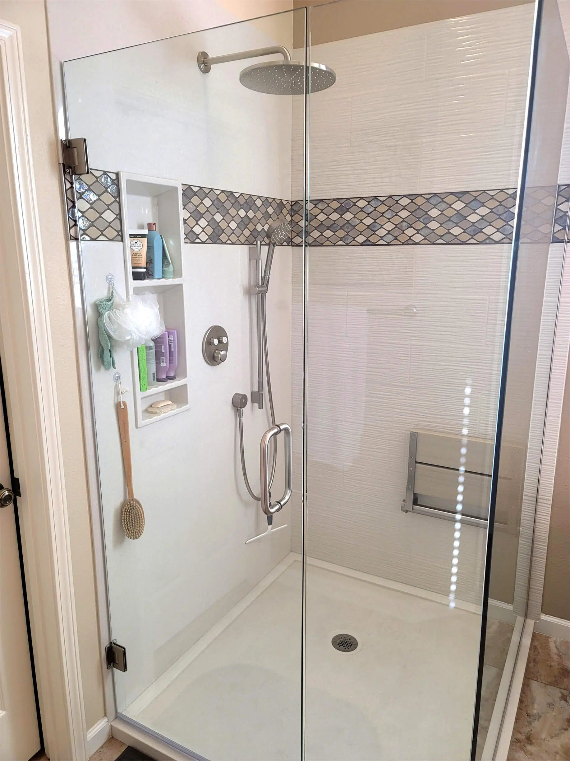 Onyx Collection Walk In Shower Onyx walk in shower with a tile inlay