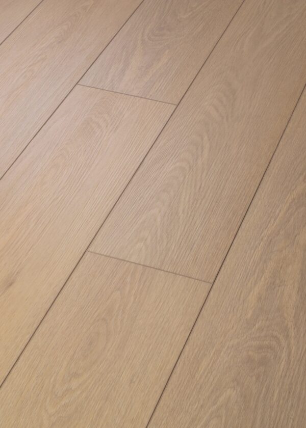 A close up shot of planks of Distinction Plus Timeless Oak Luxury Vinyl Plank flooring from Shaw Flooring.