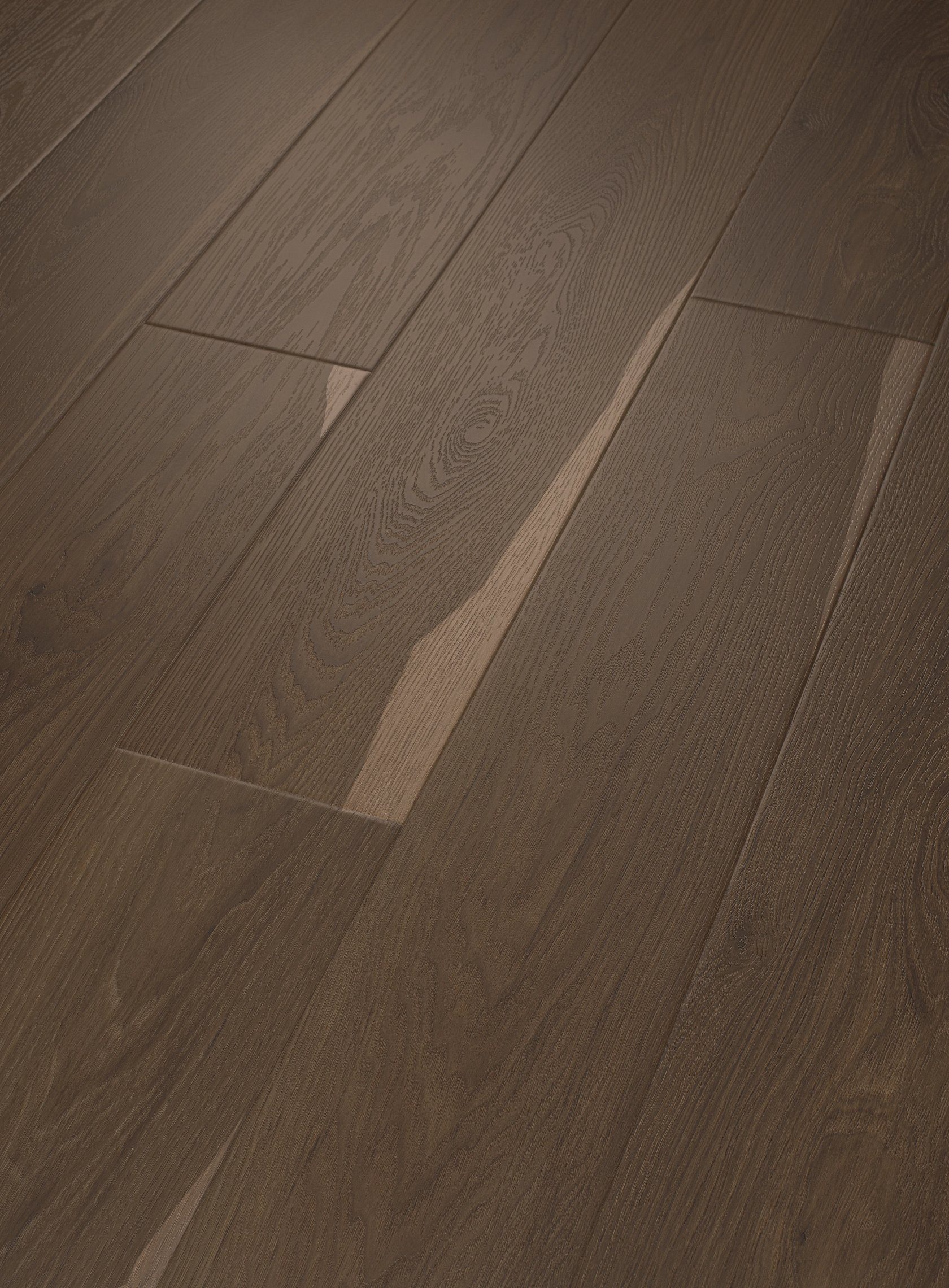 Close up view of Pantheon HD+ Natural Bevel flooring in Charred Earth color.