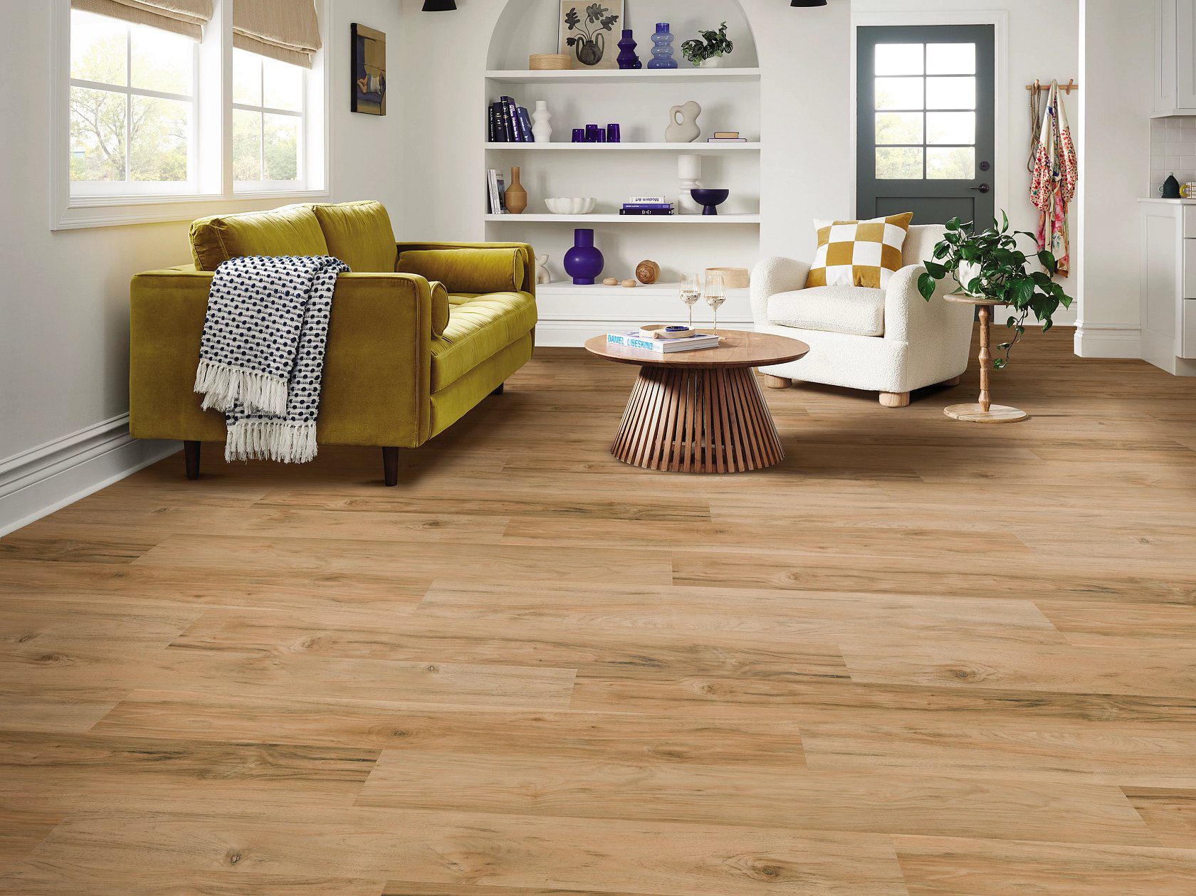 Room scene of Shaw luxury vinyl plank flooring in the color Golden Flare from their Luxury Vinyl Classic Series Collection, Ignite.