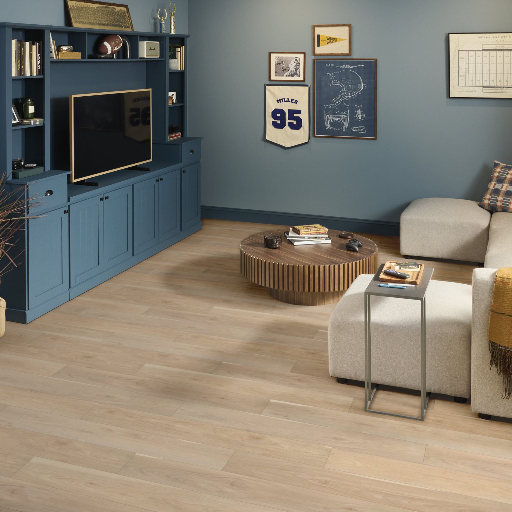 Shaw luxury vinyl plank in Alabaster from the Pantheon HD+ Natural Bevel Collection installed in a living room area.