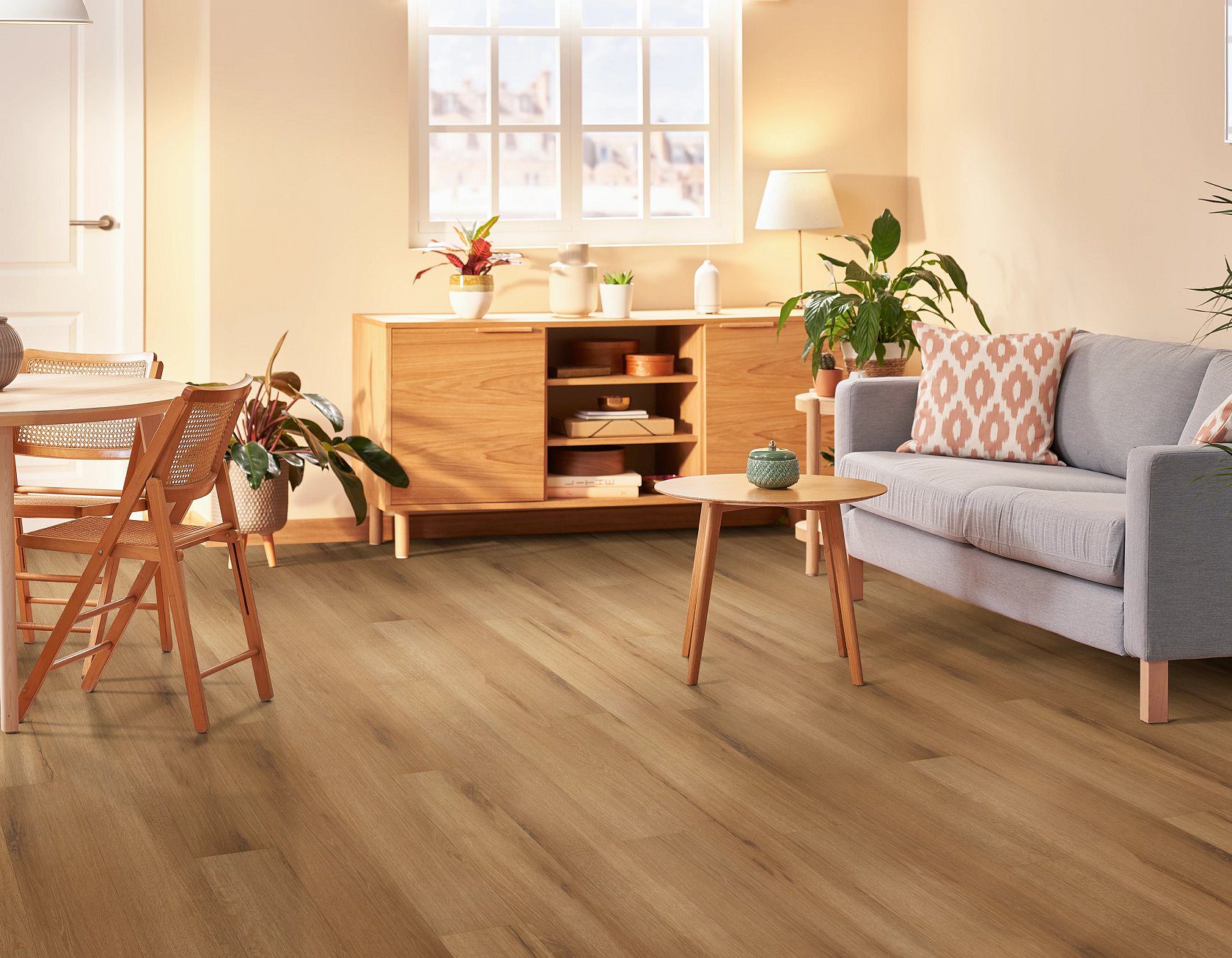 Fleetwood glue down LVP in Harvest Oak, installed in a living room area.